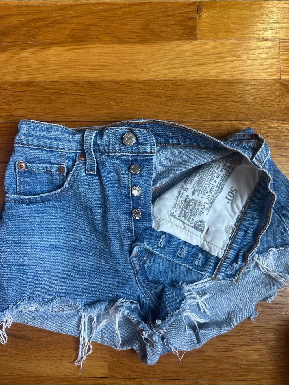 Levi's Light Blue Distressed Denim Shorts